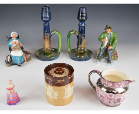 Ceramics including a pair of Arts &amp; Crafts pottery chambersticks, two Royal Doulton character figures, tobacco jar and a 