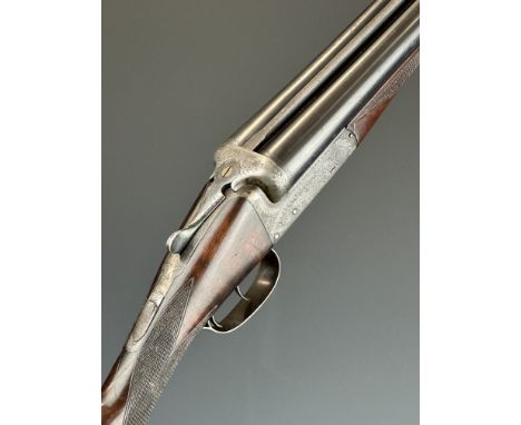 E J Churchill&nbsp;12 bore side by side ejector shotgun with named and engraved locks, engraved underside, trigger guard, top