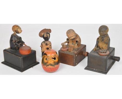 Four Japanese Kobe mechanical carved wood toys / dolls, tallest 10cm