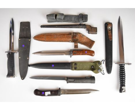 Six various bayonets including two Czechoslovakian examples with wood chip grips, Swiss style example and a British spike bay