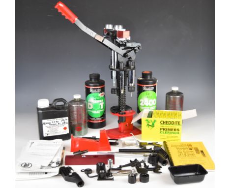 A collection of shotgun or rifle cartridge re-loading equipment and powders including MEC 600 Jr Mark 5 press, Cheddite prime