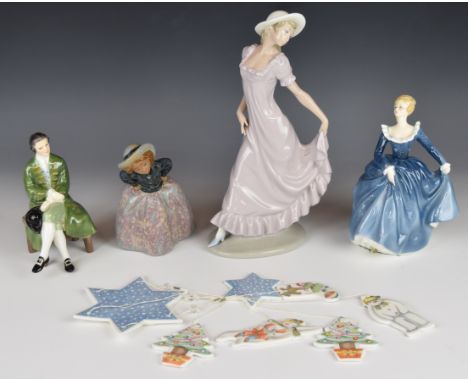 Royal Doulton and Nao figurines and a Raymond Briggs Snowman mobile, tallest 25cm