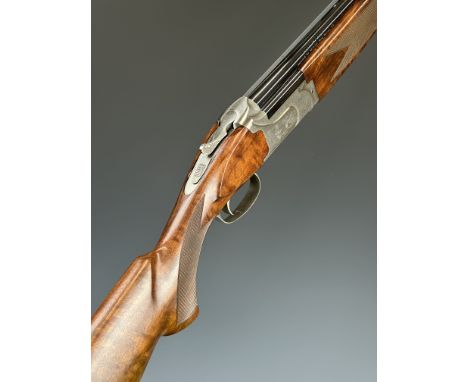 Winchester Select Platinum 12 bore over and under ejector shotgun with engraved scenes of birds to the lock and underside, en