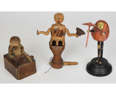 Three Japanese Kobe mechanical carved wood toys / dolls, tallest 15cm