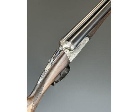 Spanish The Sabel 12 bore side by side shotgun with border engraved locks, underside, trigger guard and top plate, engraved t