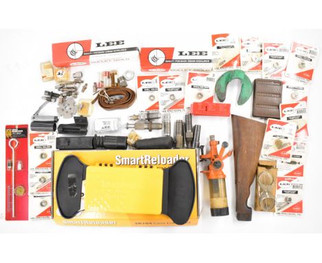 A collection of shotgun or rifle re-loading tools and accessories including Lee .433 and .395 bullet moulds, Smart Reloader S