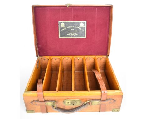 James Purdey &amp; Sons brass and leather bound oak double shotgun cartridge magazine with fitted interior for over 400 cartr