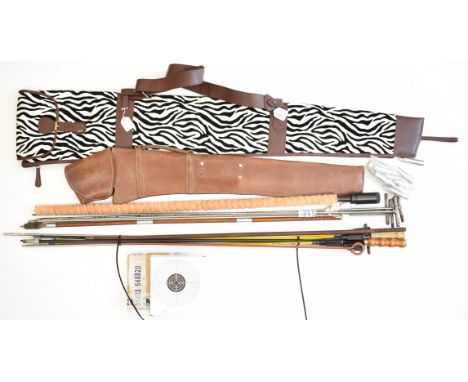 Gun cleaning rods, two gun slips, targets and other shooting accessories