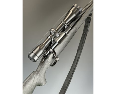 Winchester Model 70 .223 Remington bolt-action rifle with composite stock, chequered semi-pistol grip and forend, black sling