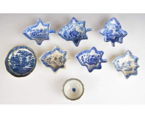 A collection of transfer printed 18th/19thC blue and white pickle dishes and a Salopian/Caughley teabowl and saucer