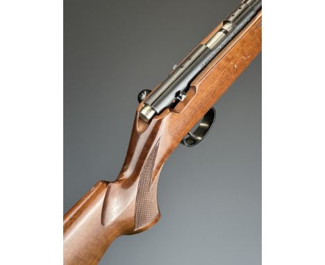 Anschutz Model 1517 left handed .17 bolt-action rifle with chequered semi-pistol grip and forend, sling mounts, multi-shot ma