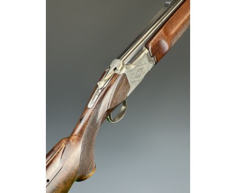 Winchester Diamond Grade Trap 12 bore over and under ejector shotgun with engraved lock, underside, trigger guard and thumb l