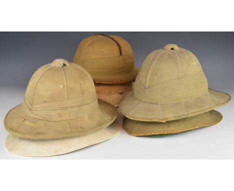 Six Wolseley / pith helmets, one with Hawkes &amp; Co Ltd stamped to inner skull, another with a Towends, London paper label 