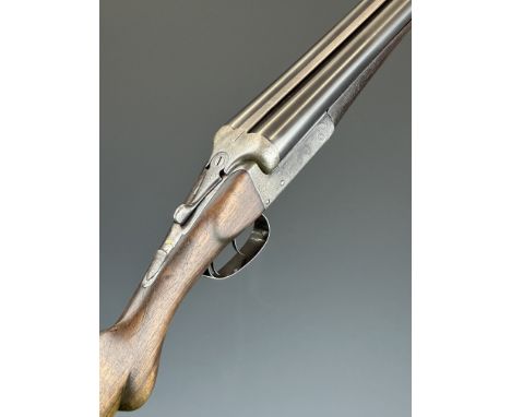 Thomas Wild 12 bore side by side shotgun with named locks, engraved dogs and birds to the locks and underside, engraved trigg