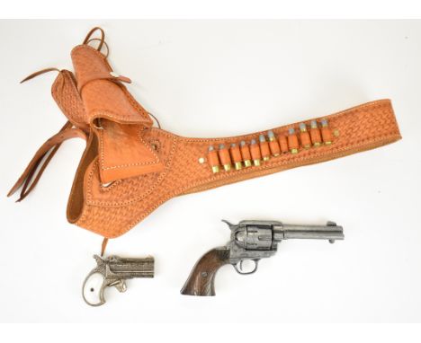 Two replica guns comprising a Derringer over and under pocket pistol with ornate decoration and a BKA Colt style revolver in 