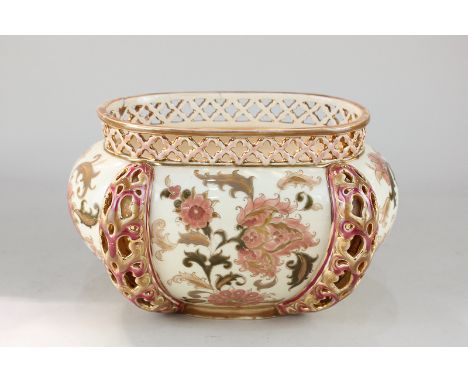 A Zsolnay Pecs porcelain vase of baluster form with pierced decoration and floral gilt design, 15.5cm high (a/f)