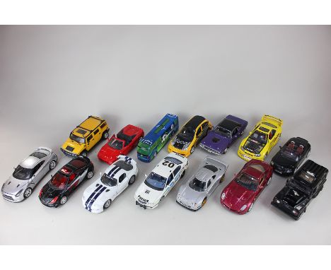 Eleven Maisto model cars, scale 1/24, including Dodge Viper GT2 and 2000 Chevrolet Impala, a 1/27 scale Hummer H2, a Chelsea 