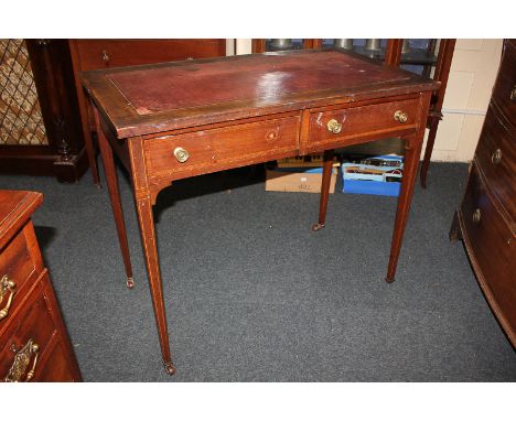 An Edwardian inlaid mahogany desk, rectangular top with red leather inset, two drawers (one handle missing), on square tapere