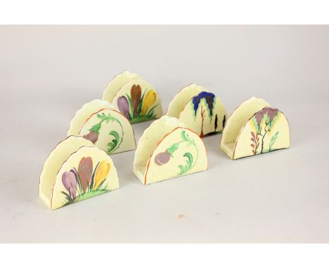 A set of six Carlton Ware ceramic napkin holders decorated with flowers, 7cm