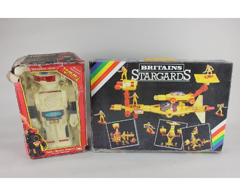 A boxed set of Britains Space Stargards, No 9147, together with Tommy the atomic robot, No 1130, battery powered in white col