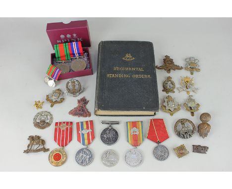 A First World War medal awarded to 2683 SJT G E Clements GAMB R, four medals relating to the liberation of Romania, various m