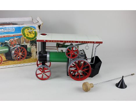 A Mamod steam traction engine, with funnel and steering extension, boxed