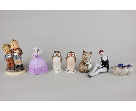 A Beswick Walt Disney owl figure with gold mark, together with another similar, a Goebel Hummel figure group 'Max and Moritz'