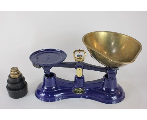 A set of Salter blue enamel kitchen scales with six weights