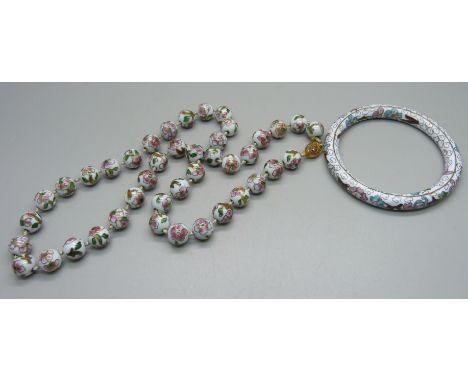 A cloisonne bead necklace and a bangle 