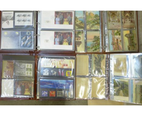 Two albums of Royal Mail millennium and Royal Family stamps, (40+ packs) two albums of European and Japanese and other worldw
