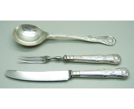 A silver spoon, 63g and a silver handled pastry knife and fork 