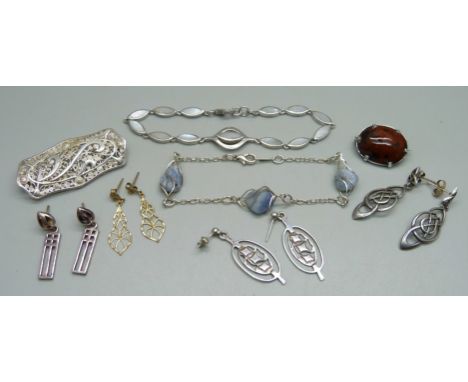 A pair of 9ct gold fretwork earrings, 0.4g, two silver brooches, a silver and mother of pearl bracelet, a pair of Malcolm Gra