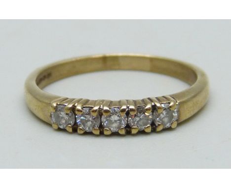 A 9ct gold ring set with five diamonds, 2g, M 