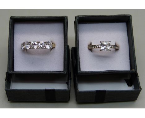 A silver gilt ring set with five cubic zirconia stones, S, and a Swarovski ring, P 