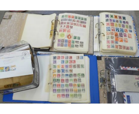 Stamps; an accumulation housed in four home made albums from Queen Victoria through to 1960's, with some covers and a large t