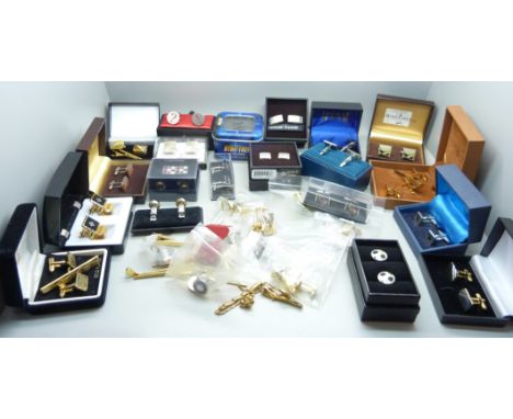 A collection of tie pins and cufflinks including Star Trek and Swarovski, mainly boxed 