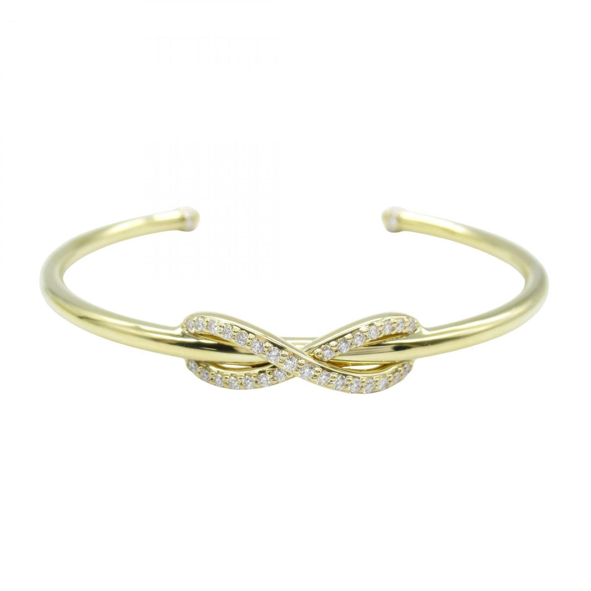 Tiffany & Co. Infinity Diamond Cuff Bangle, 18K Yellow Gold with Diamonds, Women's, and Clear