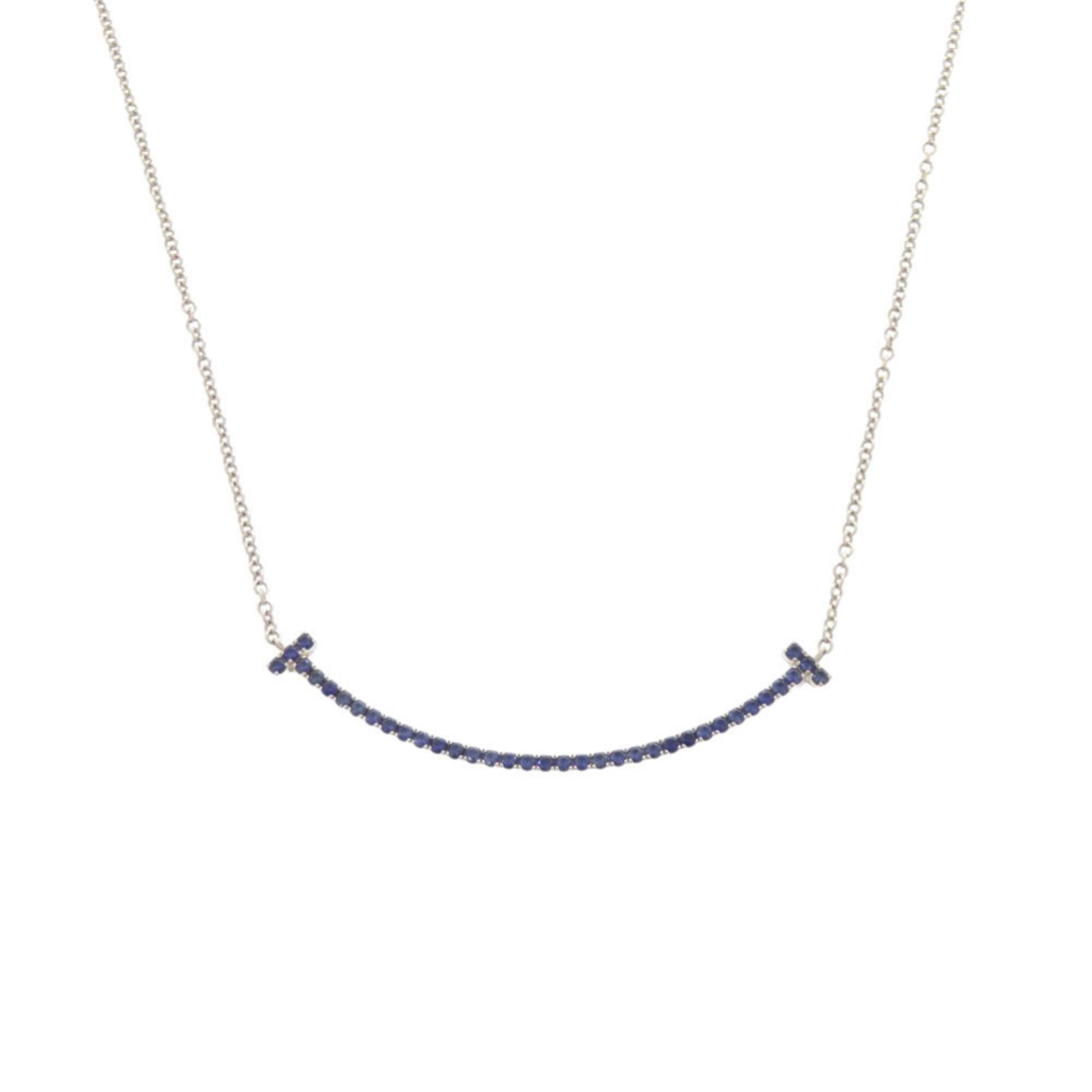 Excellent condition Tiffany T Smile small necklace in 18K white gold with sapphire and 750 gold. Ite