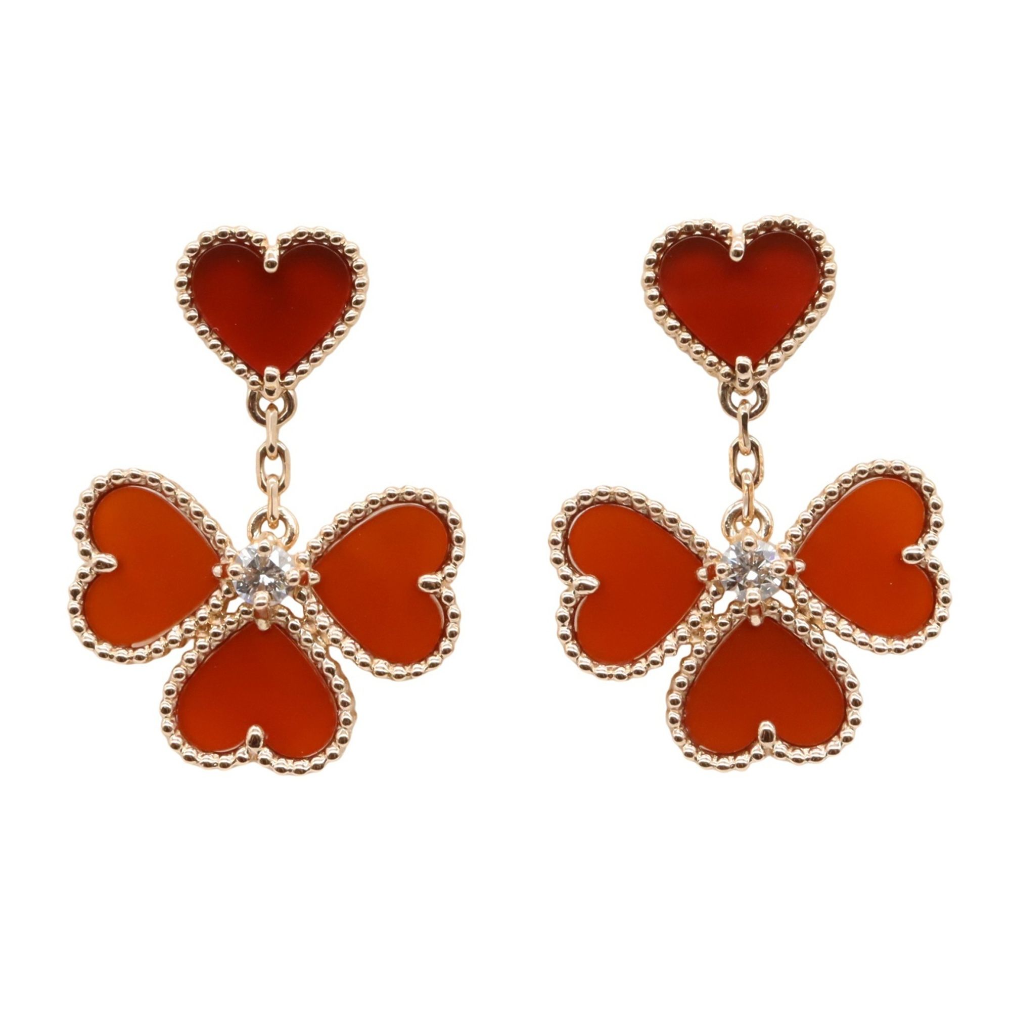 Van Cleef & Arpels Sweet Alhambra Heart Earrings in 18K Pink Gold with Diamonds and Carnelian. Avail