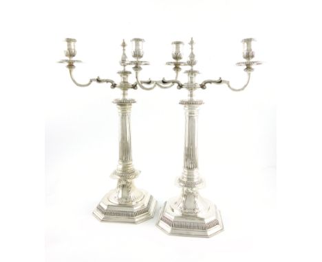 A pair of Victorian silver two-light candelabrum, by George Lambert, London 1893, in the Queen Anne manner, slight tapering f