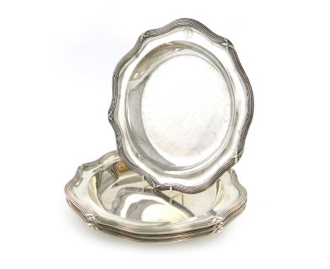A set of four Victorian silver soup plates/dishes, by John Samuel Hunt, London 1855, shaped circular form, reeded borders, en