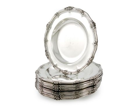 A set of twelve George IV regimental silver soup plates, by Robert Garrard, London 1829, retailed by Garrards, Panton Street,