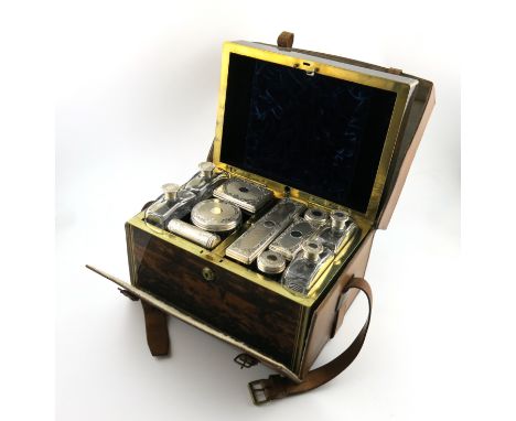 λA Victorian silver gentleman's travelling dressing table set, by Frances Douglas, London 1854/55, retailed by Lund, Maker, C