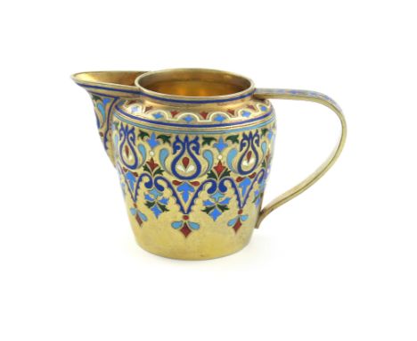 A 19th century Russian silver-gilt and enamel cream jug, by Grachev, St. Petersburg 1884, tapering circular form, scroll hand