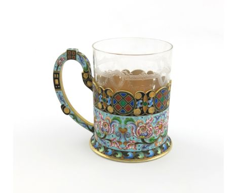 A Russian silver-gilt and enamel tea glass holder, by the 6th Artel, circa 1915, Moscow  marks for 1908-1926, circular form, 