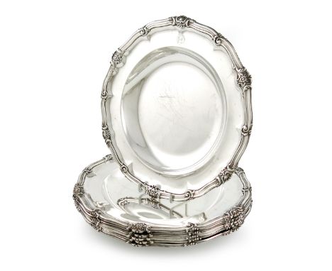 A set of six George IV regimental silver soup plates, by Robert Garrard, London 1829, retailed by Garrards, Panton Street, Lo