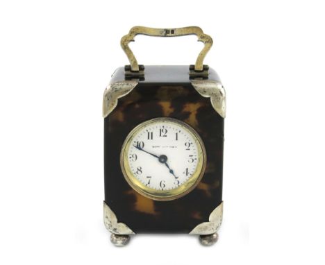 λA silver-gilt mounted tortoiseshell clock, by Charles and Richard Comyns, London 1919, retailed by Mappin and Webb, rectangu