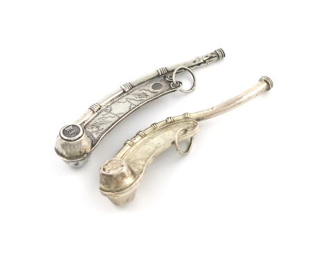 A Victorian silver bosun's call, by Henry Aston, Birmingham 1862, engraved decoration, embossed with a crowned anchor, and wi