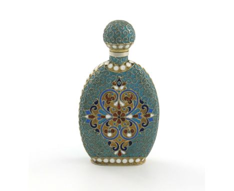 A late 19th century Russian silver-gilt and enamel scent bottle, maker's mark worn, Moscow circa 1890, shaped compressed rect