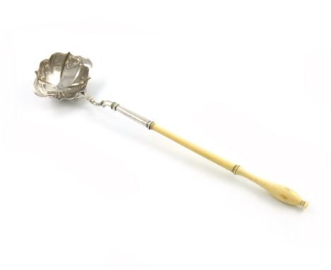 λA George II silver punch ladle, maker's mark worn, London 1742, shaped oval bowl, bifurcated joint, the reverse of the bowl 